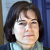 A photo of a woman with dark hair. 