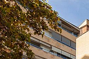 A photo of a modern apartment building.