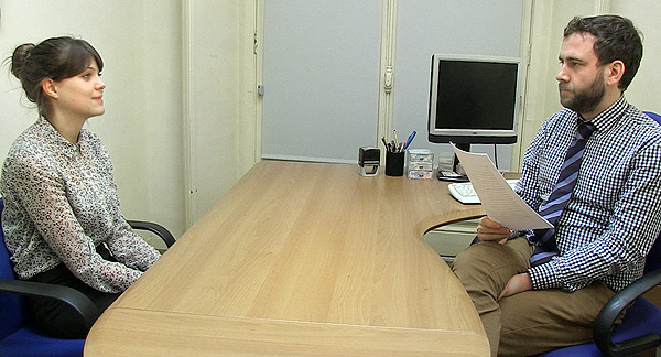 A photo of a scene from the video of an interview.