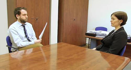 A photo of a job interview in progress.