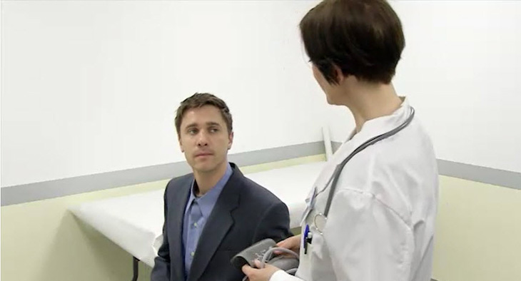 A photo of a scene from the video, of a doctor and patient during a medical consultation.
