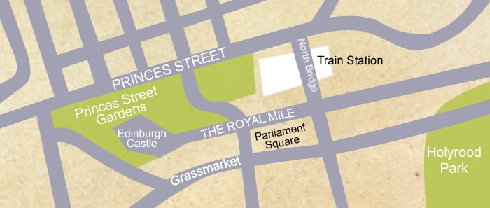 A street map of Edinburgh. In the middle of the map is a park, Princes Streete Gardens. Next to the gardens is Edinburgh Caslte. On the left of the gardens is the train station, in North Bridge street. Grassmarket street is behind the caslte. The Parliament Square is in the Royal Mile street. 