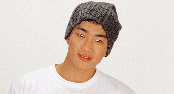 A photo of an young Asian wearing a cap. 