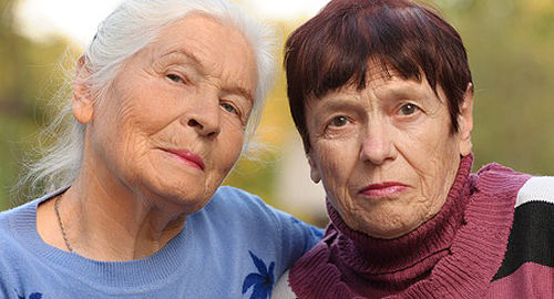 A photo of two older women. 