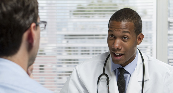 A photo of a patient and doctor during a medical consultation.