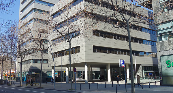A photo of a modern office building.