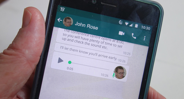 A photo of a chat and voice message on a mobile phone.
