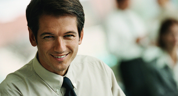 A photo of the manager of a company.