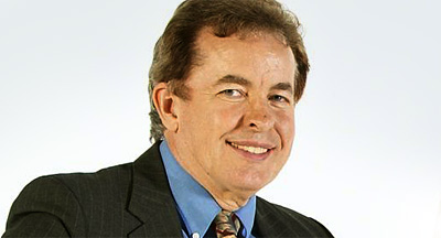 A photo of a man in a suit. 